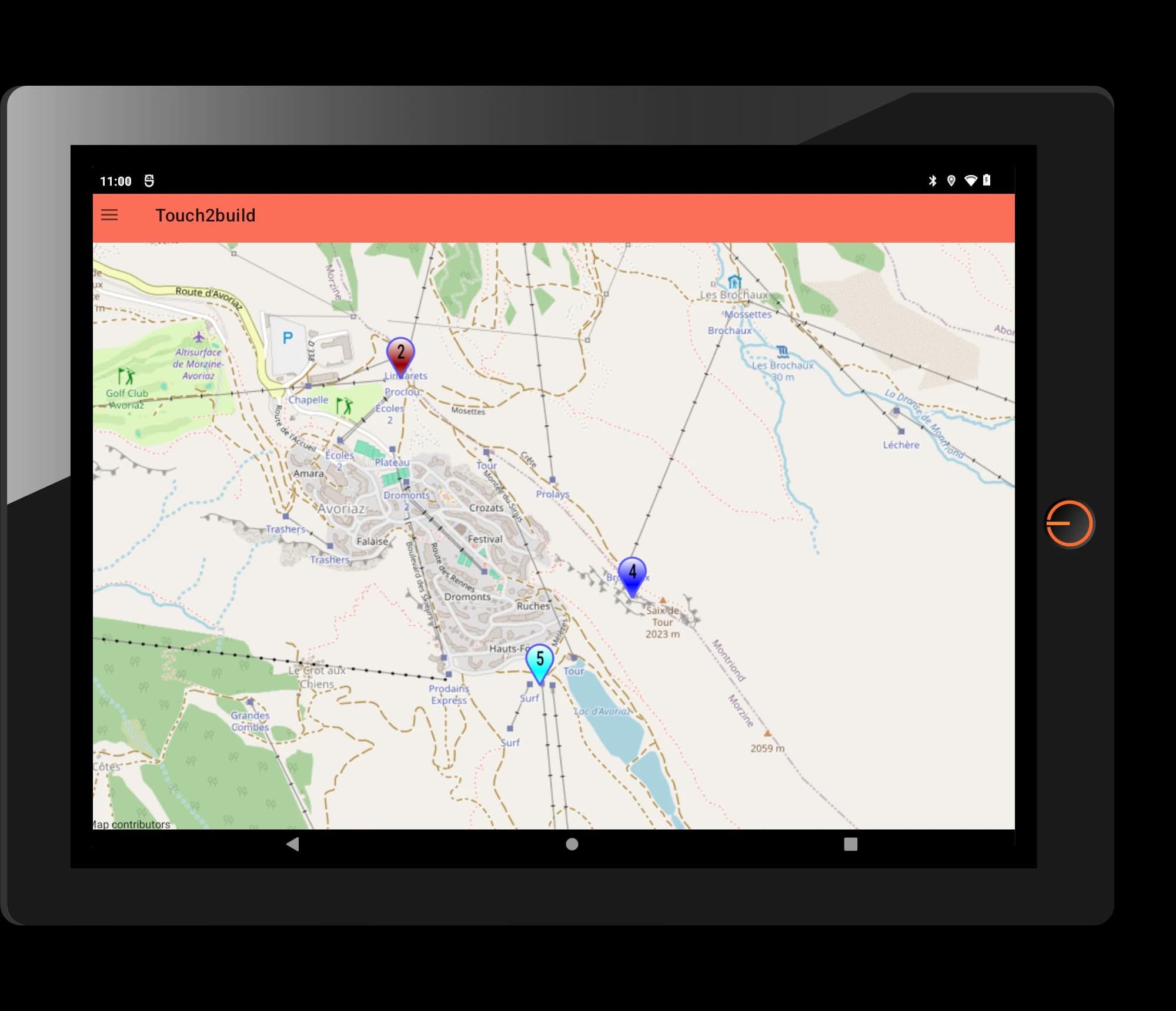 Tablette affichant dans Touch2build une carte d’Avoriaz avec des tâches géolocalisées